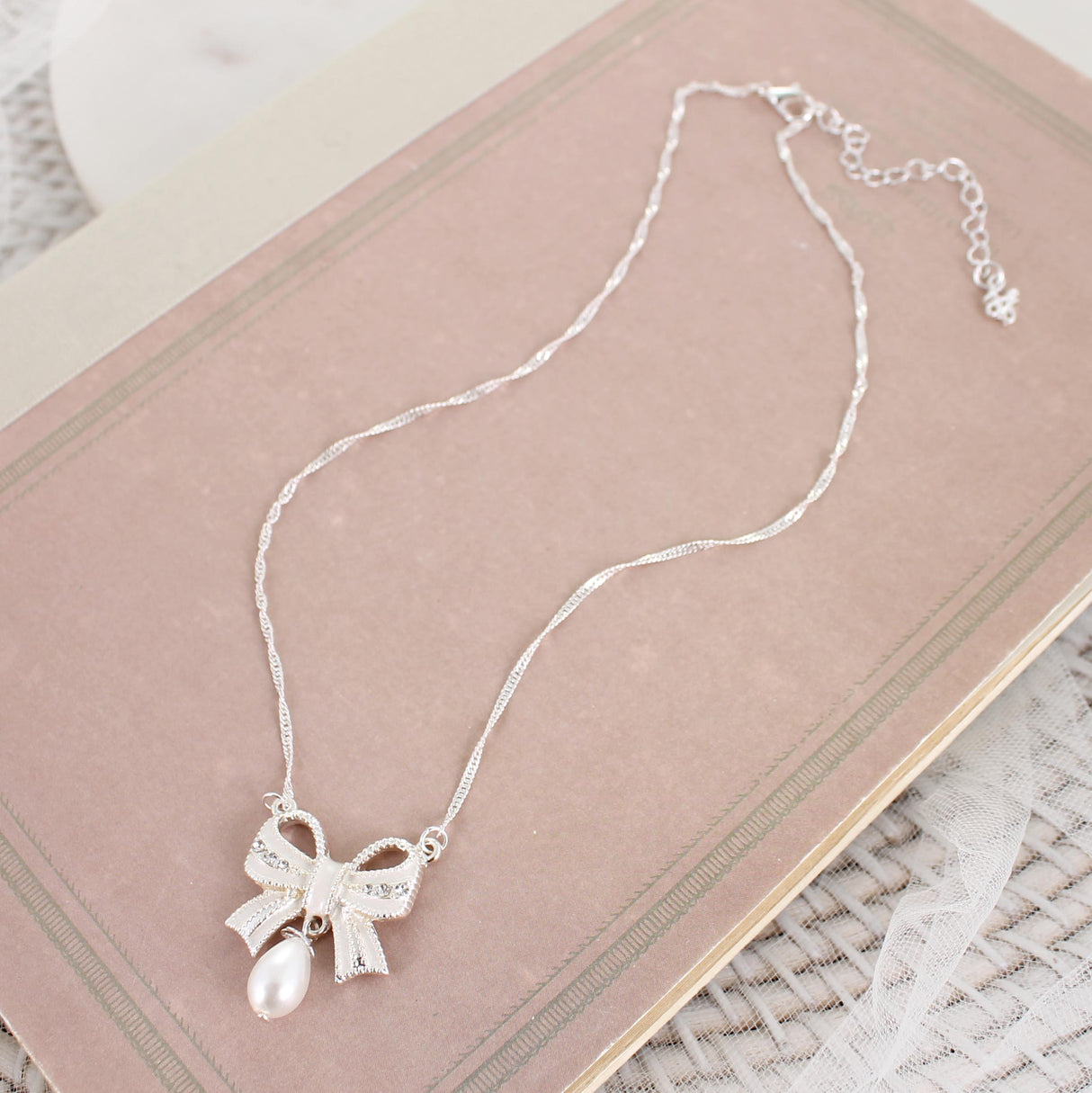 Crystal Bow w/Dangle Pearl Necklace