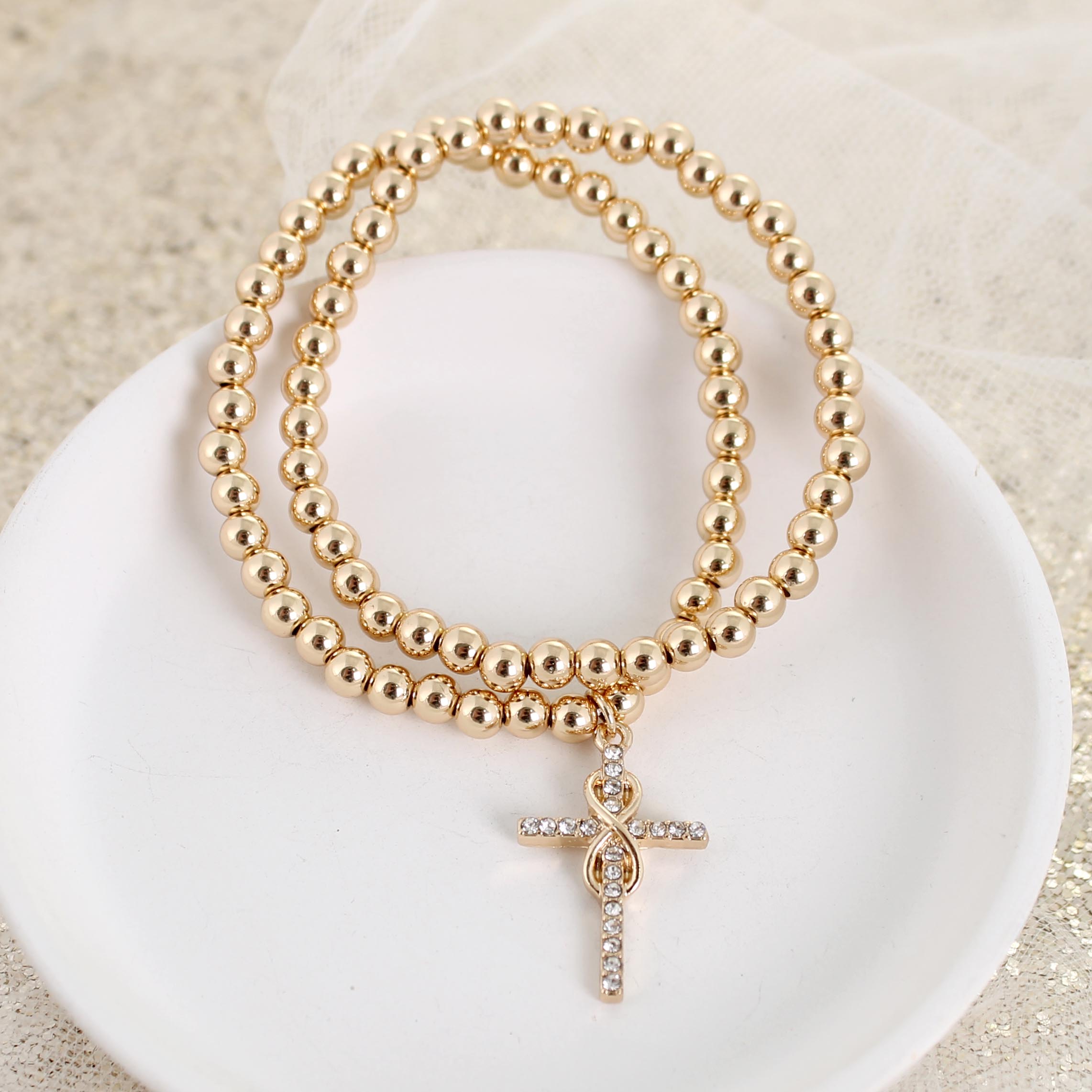 Crystal Infinity Cross Stretch Bracelet – Seasons Jewelry - Retail