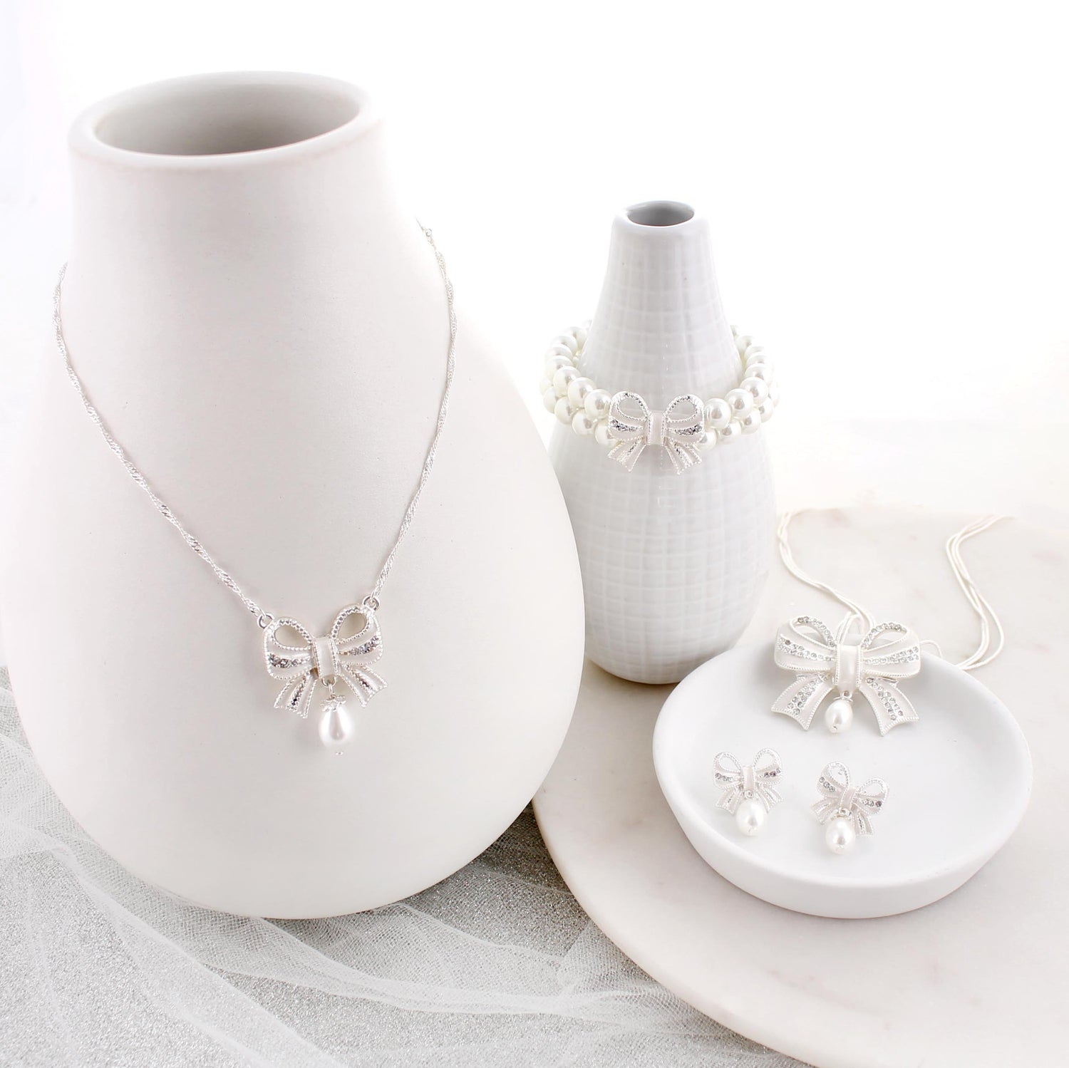 Crystal Bow w/Dangle Pearl Necklace