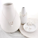 Crystal Bow w/Dangle Pearl Necklace